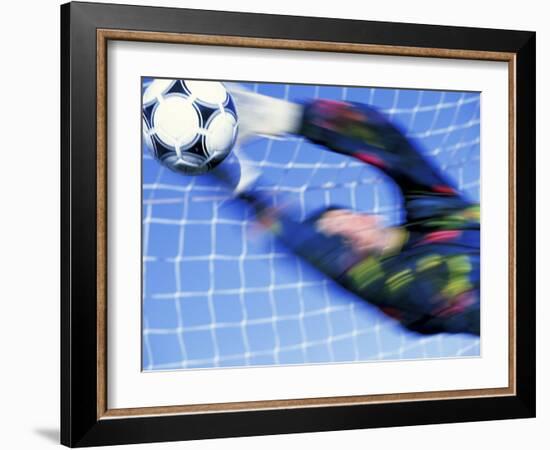 Goalie Attempting to Stop a Soccer Ball-null-Framed Photographic Print