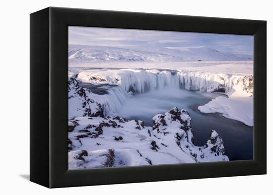 Godafoss waterfall frozen during winter, Iceland-Ross Hoddinott-Framed Premier Image Canvas