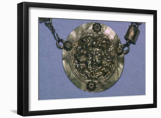 Gold Roman Gorgon's head pendant. Artist: Unknown-Unknown-Framed Giclee Print