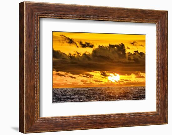 Golden light of the setting sun reflects a red glow on the beach at Pererenan Beach, Bali.-Greg Johnston-Framed Photographic Print