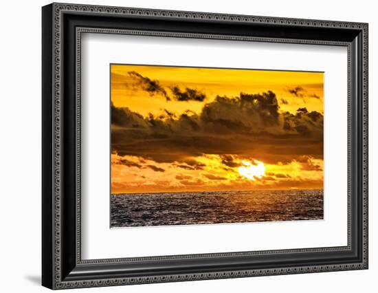 Golden light of the setting sun reflects a red glow on the beach at Pererenan Beach, Bali.-Greg Johnston-Framed Photographic Print