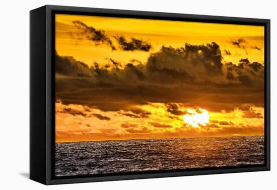Golden light of the setting sun reflects a red glow on the beach at Pererenan Beach, Bali.-Greg Johnston-Framed Premier Image Canvas