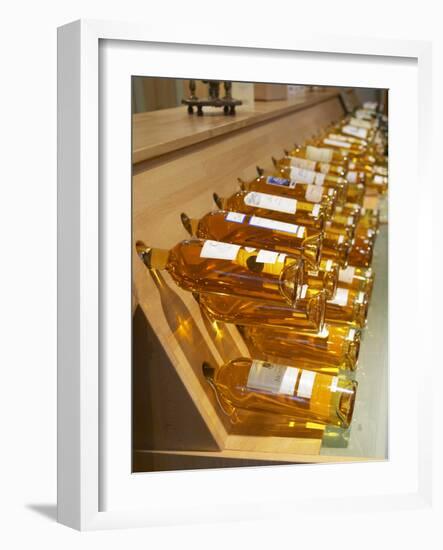 Golden Yellow Bottles of White Bergerac and Monbazillac Wine, Maison De Vin in Bergerac, Dordogne-Per Karlsson-Framed Photographic Print