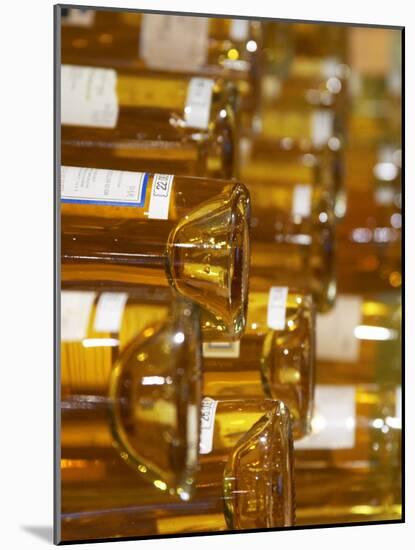 Golden Yellow Bottles of White Bergerac and Monbazillac Wine, Maison De Vin in Bergerac, Dordogne-Per Karlsson-Mounted Photographic Print