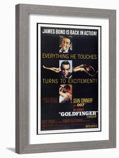 Goldfinger-null-Framed Art Print