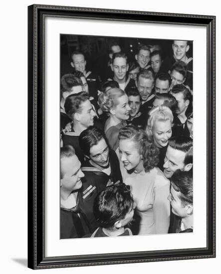 Goldwyn Girls Mingling with Navy Officers-null-Framed Photographic Print