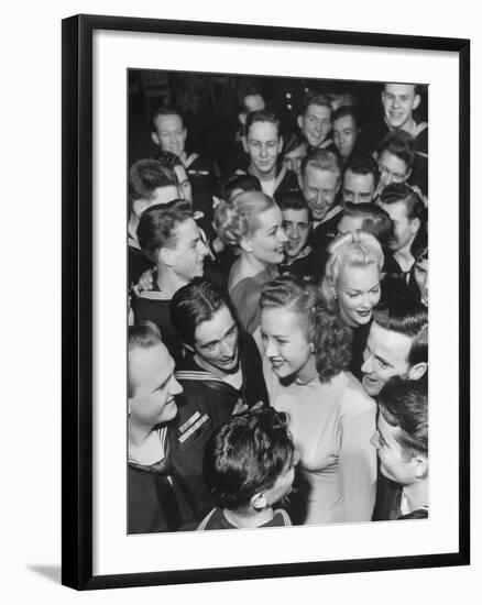 Goldwyn Girls Mingling with Navy Officers-null-Framed Photographic Print