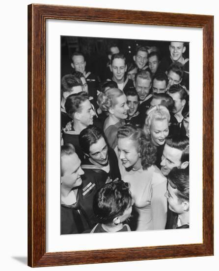 Goldwyn Girls Mingling with Navy Officers-null-Framed Photographic Print