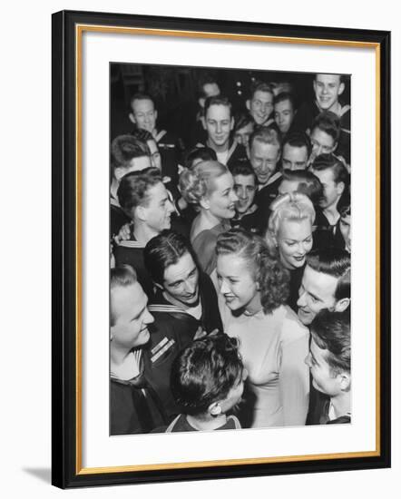 Goldwyn Girls Mingling with Navy Officers-null-Framed Photographic Print
