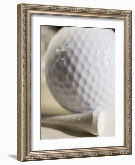 Golf Ball and Golf Tee-Tom Grill-Framed Photographic Print