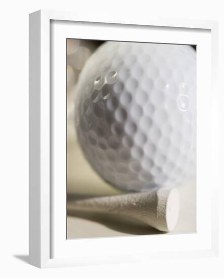 Golf Ball and Golf Tee-Tom Grill-Framed Photographic Print