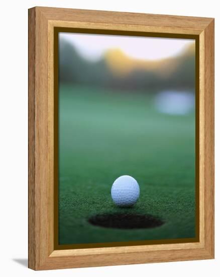 Golf Ball Close to Hole-Robert Llewellyn-Framed Premier Image Canvas