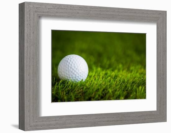 Golf Ball on Green Grass-jannoon028-Framed Photographic Print