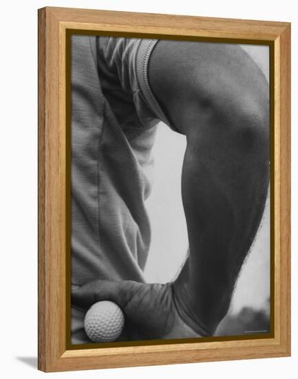 Golfer Arnold Palmer, Holding Golf Ball in Hand-John Dominis-Framed Premier Image Canvas