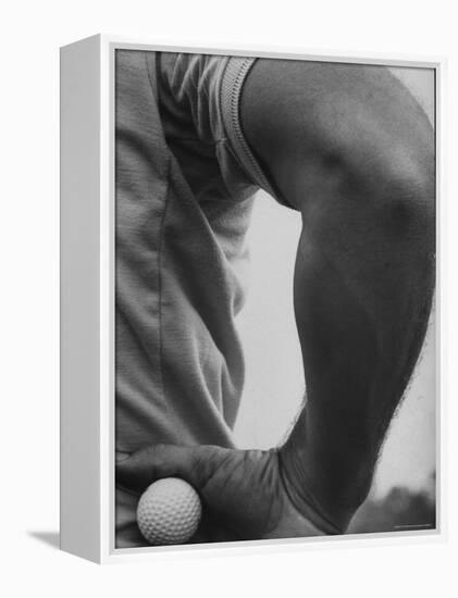 Golfer Arnold Palmer, Holding Golf Ball in Hand-John Dominis-Framed Premier Image Canvas