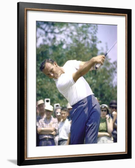 Golfer Arnold Palmer Swinging Club as Spectators Look on at Event-John Dominis-Framed Premium Photographic Print