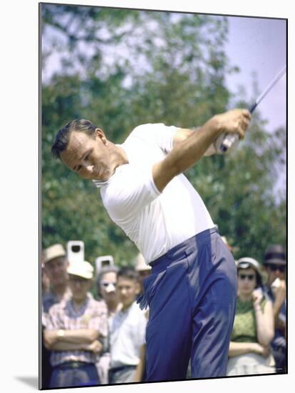 Golfer Arnold Palmer Swinging Club as Spectators Look on at Event-John Dominis-Mounted Premium Photographic Print