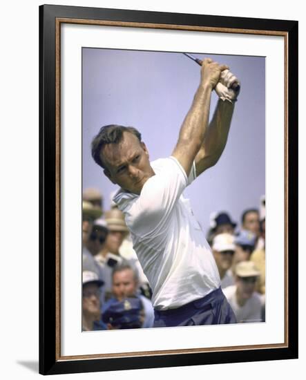 Golfer Arnold Palmer Swinging Club as Spectators Look on at Event-John Dominis-Framed Premium Photographic Print