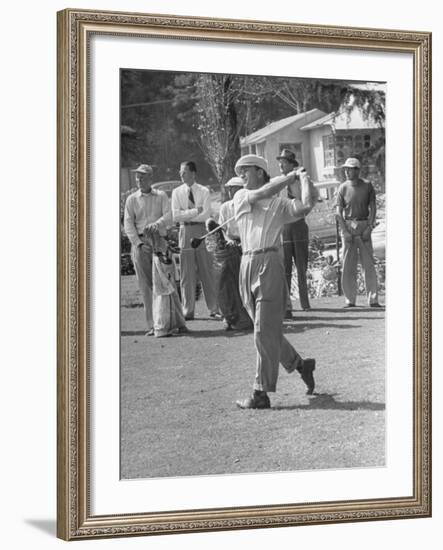 Golfer Ben Hogan, Following Through with His Golf Swing-Loomis Dean-Framed Premium Photographic Print