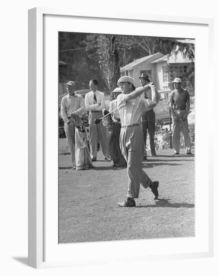 Golfer Ben Hogan, Following Through with His Golf Swing-Loomis Dean-Framed Premium Photographic Print