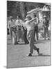 Golfer Ben Hogan, Following Through with His Golf Swing-Loomis Dean-Mounted Premium Photographic Print