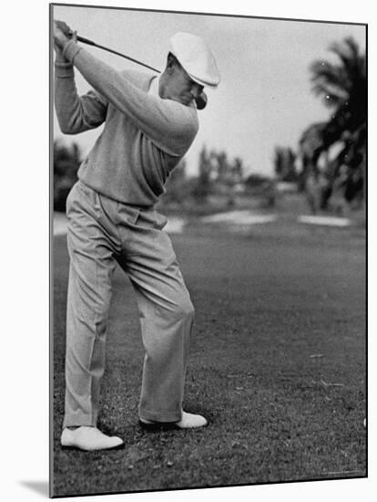 Golfer Ben Hogan, Keeping His Shoulders Level at Top of Swing-J^ R^ Eyerman-Mounted Premium Photographic Print