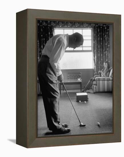 Golfer Ben Hogan Practicing Putting in His town house with Wife Valerie Watching from Armchair-Loomis Dean-Framed Premier Image Canvas