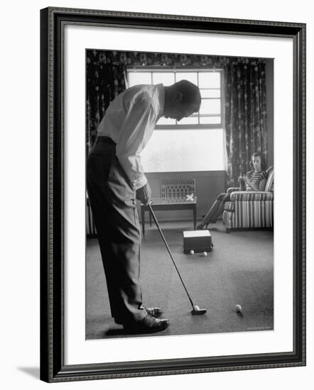 Golfer Ben Hogan Practicing Putting in His town house with Wife Valerie Watching from Armchair-Loomis Dean-Framed Premium Photographic Print