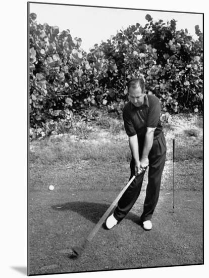 Golfer Claude Harmon Leading with Left Hip as He Hits Ball-J^ R^ Eyerman-Mounted Premium Photographic Print