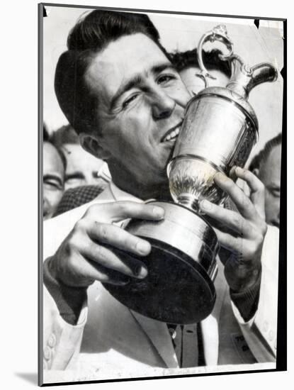 Golfer Gary Player Celebrates Winning the Open Golf Championship by Kissing Trophy-null-Mounted Photographic Print