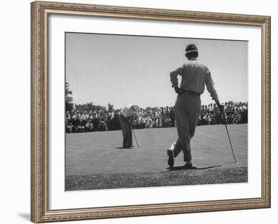 Golfer Putting the 12th Green-null-Framed Photographic Print