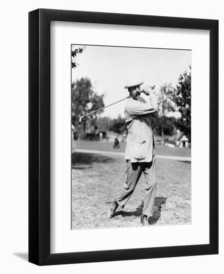 Golfer Ted Ray Swinging a Club Photograph-Lantern Press-Framed Art Print