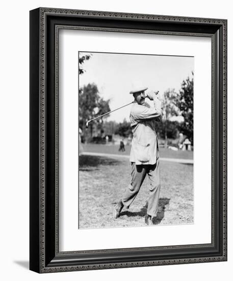 Golfer Ted Ray Swinging a Club Photograph-Lantern Press-Framed Art Print