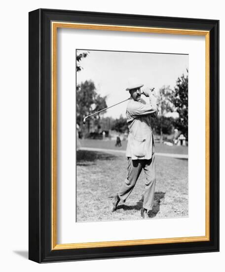 Golfer Ted Ray Swinging a Club Photograph-Lantern Press-Framed Art Print