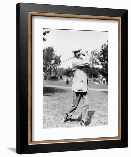 Golfer Ted Ray Swinging a Club Photograph-Lantern Press-Framed Premium Giclee Print