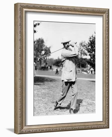 Golfer Ted Ray Swinging a Club Photograph-Lantern Press-Framed Art Print