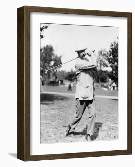 Golfer Ted Ray Swinging a Club Photograph-Lantern Press-Framed Art Print