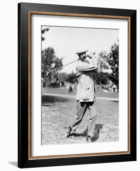 Golfer Ted Ray Swinging a Club Photograph-Lantern Press-Framed Art Print