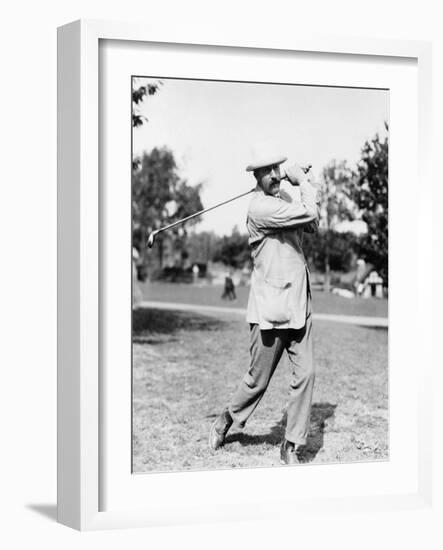 Golfer Ted Ray Swinging a Club Photograph-Lantern Press-Framed Art Print