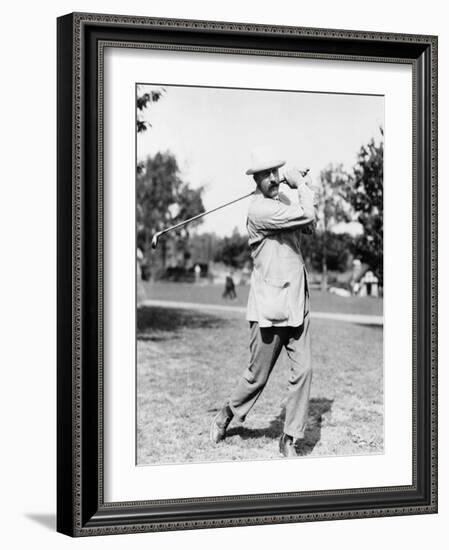 Golfer Ted Ray Swinging a Club Photograph-Lantern Press-Framed Art Print