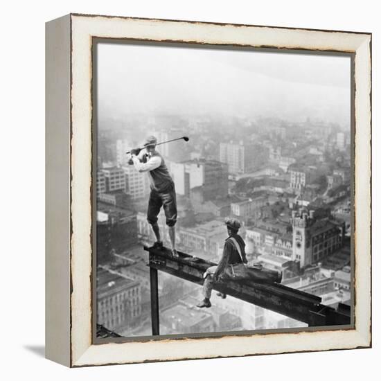 Golfer Teeing off on Girder High above City-null-Framed Premier Image Canvas