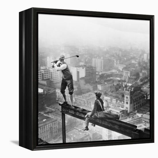 Golfer Teeing off on Girder High above City-null-Framed Premier Image Canvas