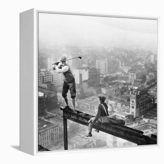 Golfer Teeing off on Girder High above City-null-Framed Premier Image Canvas