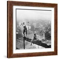 Golfer Teeing off on Girder High above City-null-Framed Photographic Print