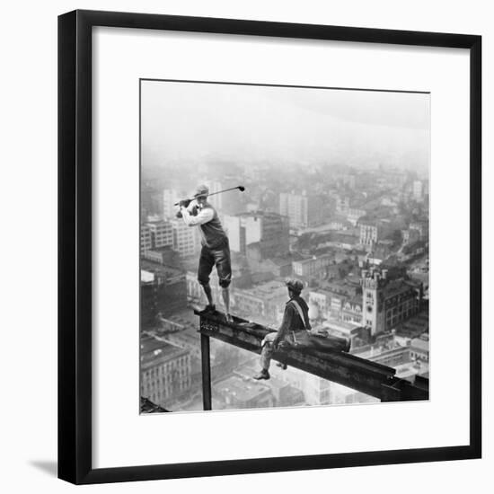 Golfer Teeing off on Girder High above City-null-Framed Photographic Print