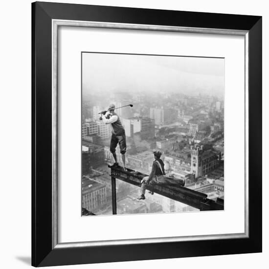 Golfer Teeing off on Girder High above City-null-Framed Photographic Print