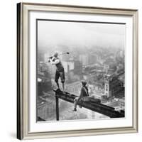 Golfer Teeing off on Girder High above City-null-Framed Photographic Print