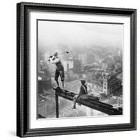 Golfer Teeing off on Girder High above City-null-Framed Photographic Print