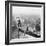 Golfer Teeing off on Girder High above City-null-Framed Photographic Print