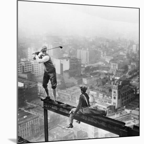 Golfer Teeing off on Girder High above City-null-Mounted Giclee Print